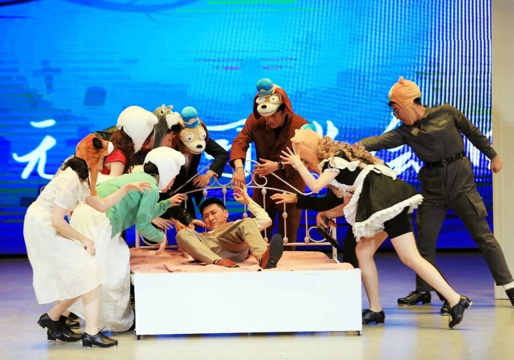 The ensemble mid-number in costume, with a painted backdrop behind them