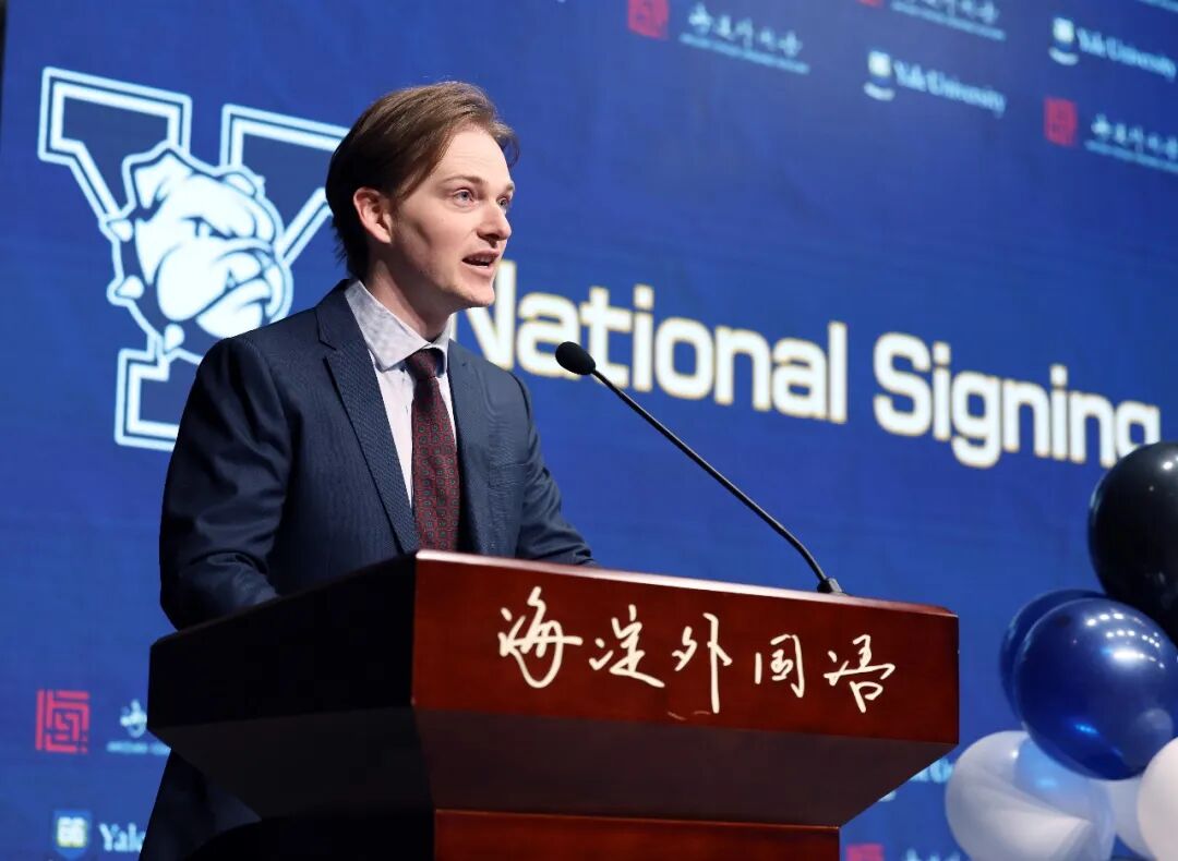 The host, David, speaking at the signing ceremony