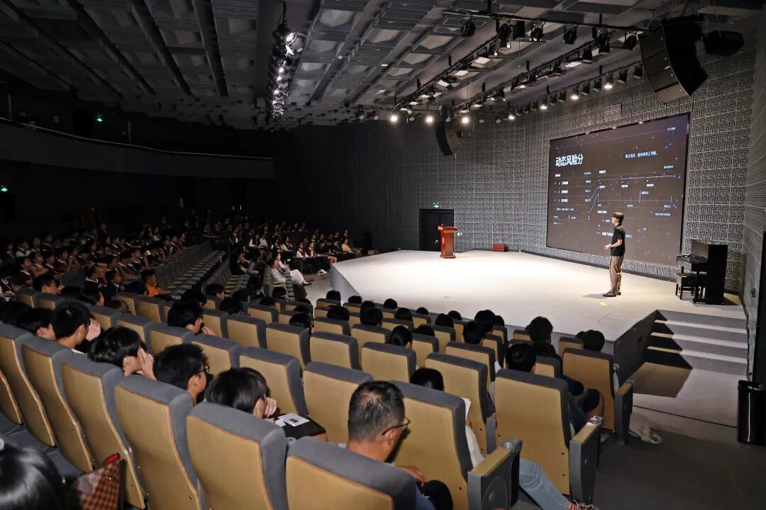 The audience in the school auditorium during the vocabulary project launch